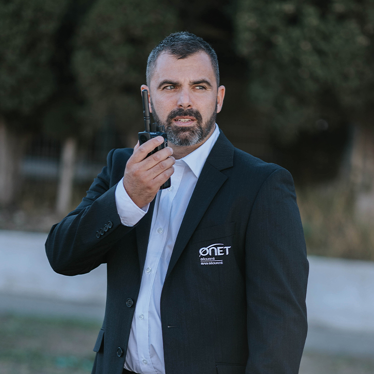 Security and prevention officer talking in a talki walki